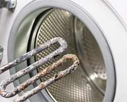 Hard water buildup on washing machine coil